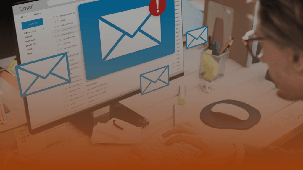 Whissel Strategies Person at desk viewing an email inbox on a computer screen, with large envelope icons and a red exclamation mark overlayed—showcasing urgent notifications for Whissel Strategies, a leading Toronto Marketing Agency. Toronto Digital Marketing Agency