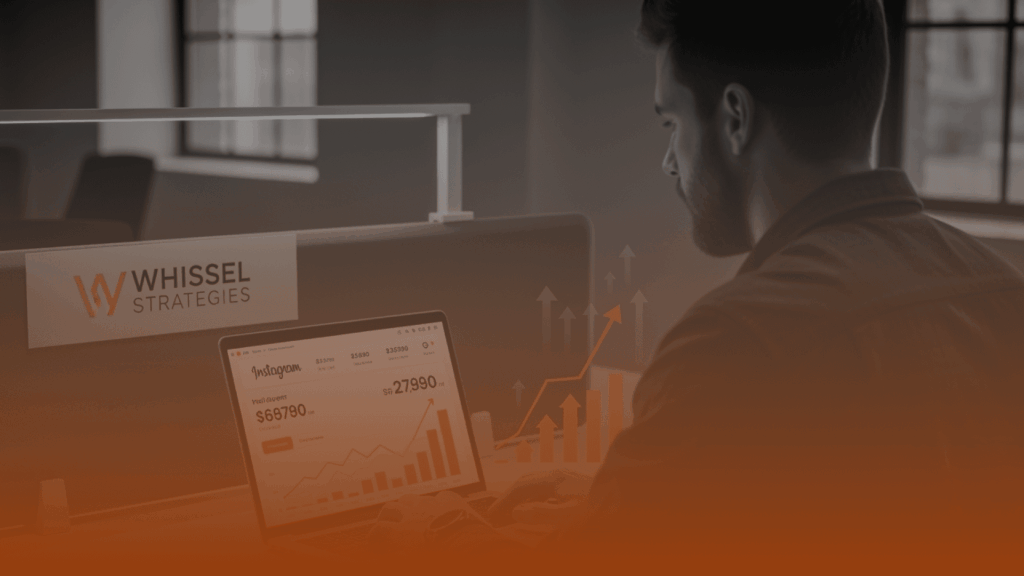 Whissel Strategies A man reviews digital marketing analytics on a laptop at a desk labeled "Whissel Strategies" in a modern office setting. Toronto Digital Marketing Agency