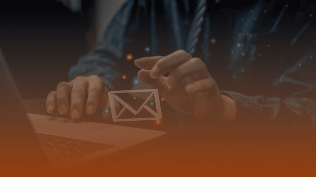 Whissel Strategies Person using a laptop with a digital envelope email icon floating in front of their hand, symbolizing sending or receiving email messages at a Toronto Marketing Agency. Toronto Digital Marketing Agency