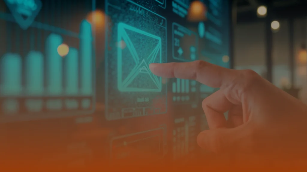 Whissel Strategies A hand touches a digital touchscreen displaying charts, graphs, and a large envelope icon, suggesting digital communication or data analysis. Toronto Digital Marketing Agency