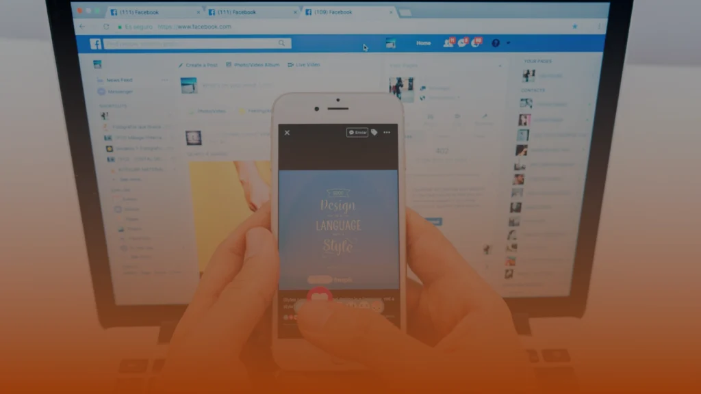 Whissel Strategies Person holding a smartphone in front of a laptop screen, both displaying social media pages. Toronto Digital Marketing Agency