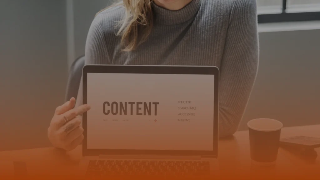 Business professional reviewing digital marketing data on a laptop