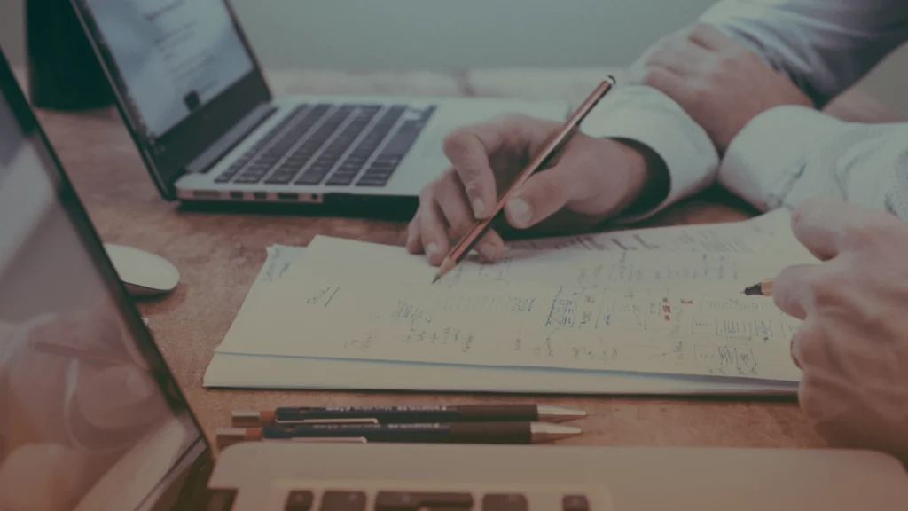 Business professionals reviewing growth strategy performance data