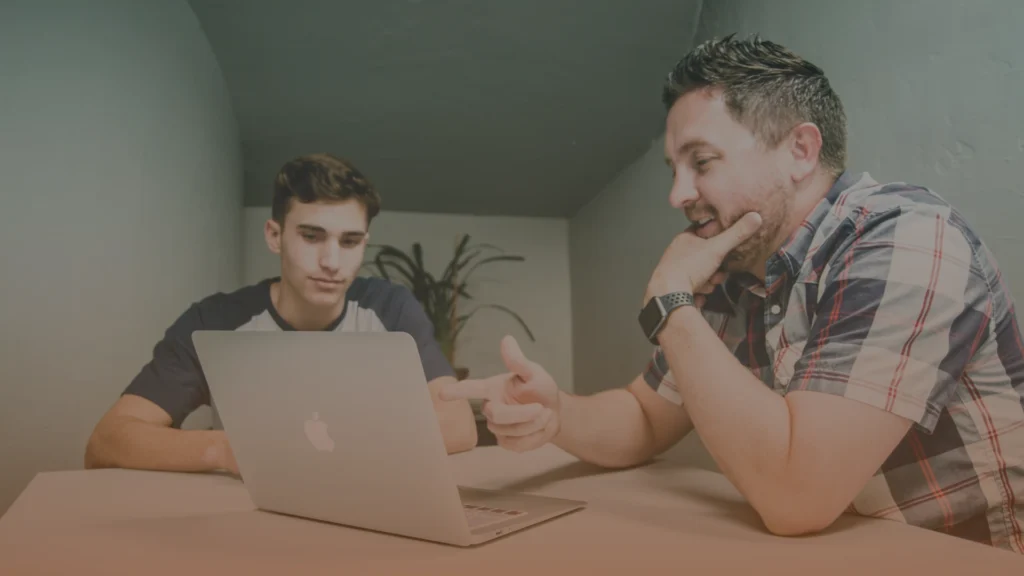 Business professionals evaluating a marketing strategy consultant