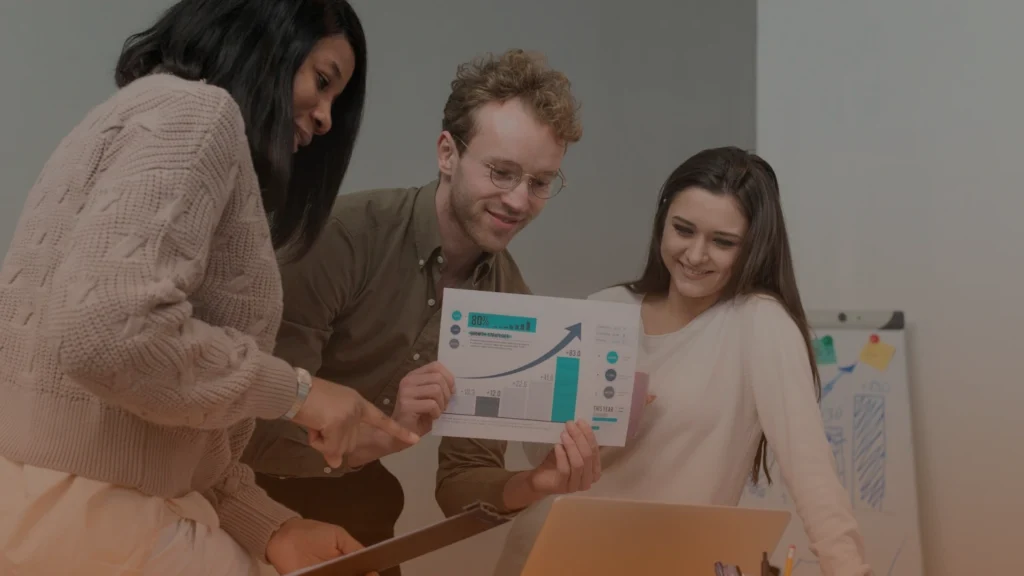 Marketing professionals reviewing client feedback and ROI performance data